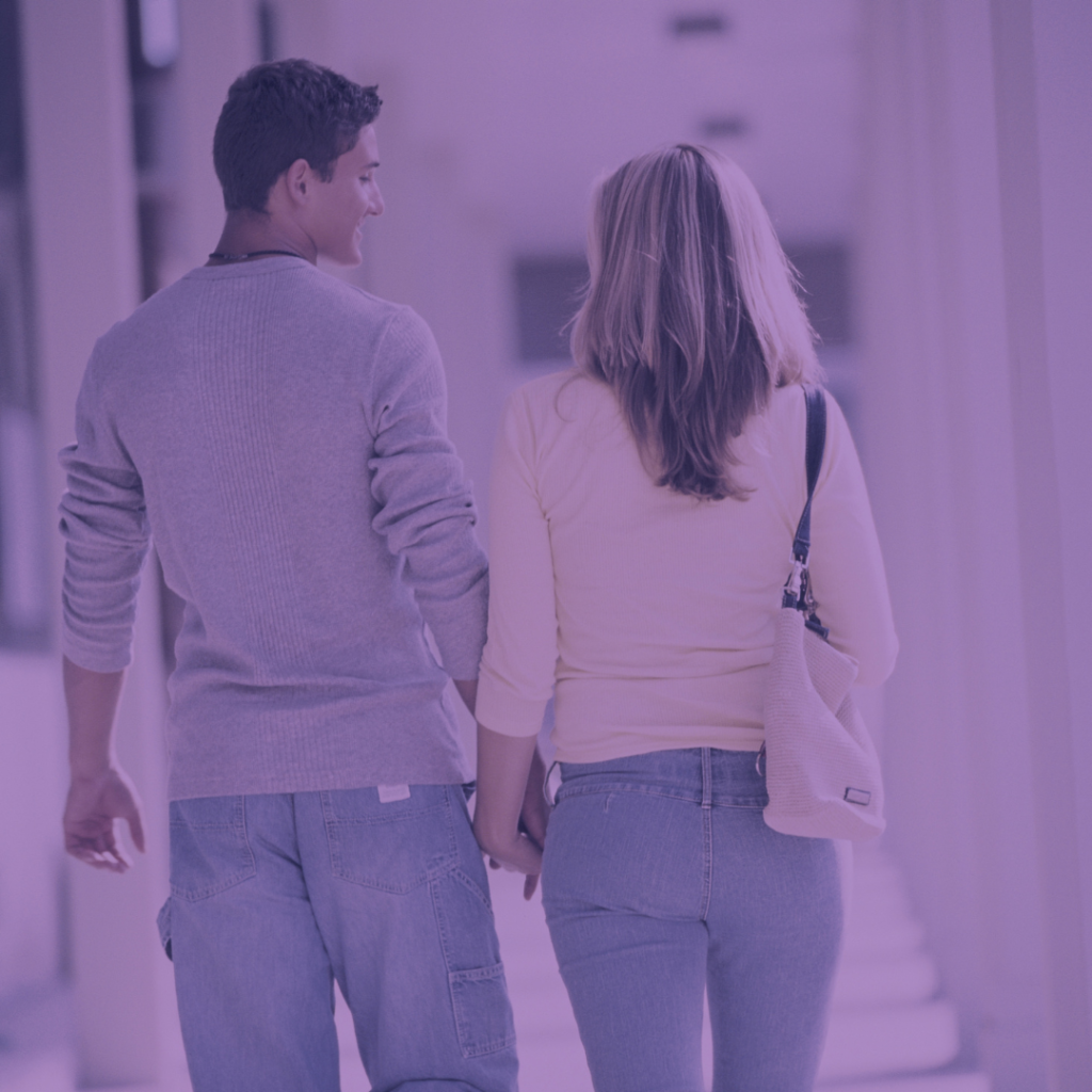 young couple holding hands