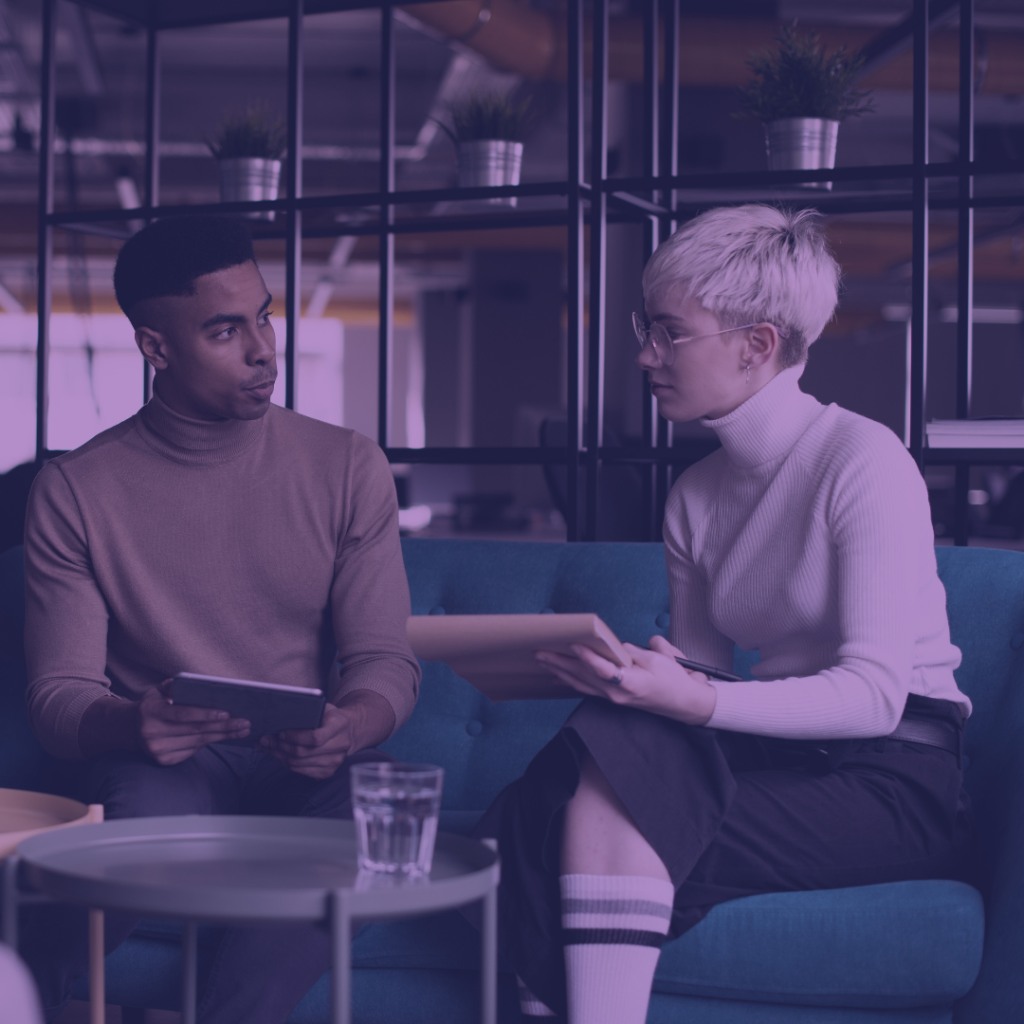 two coworkers talking
