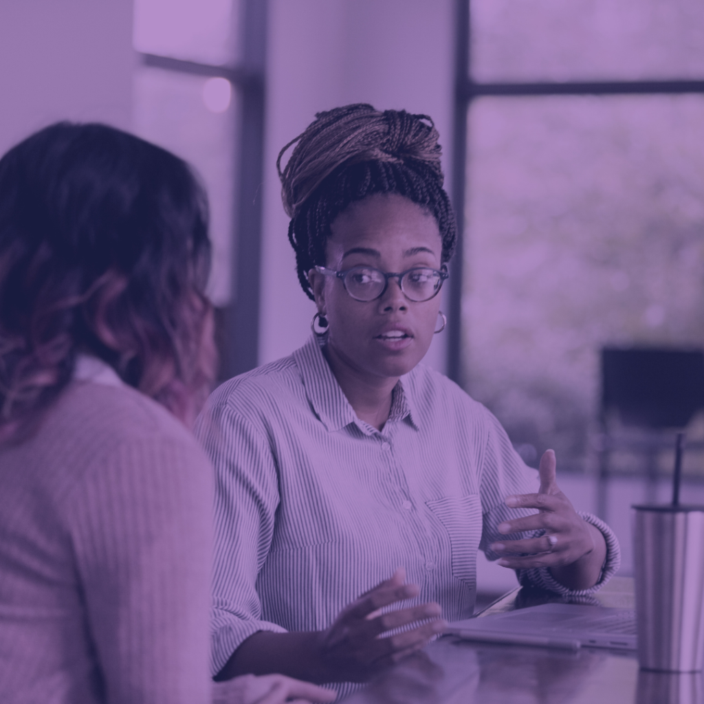 two people talking at work